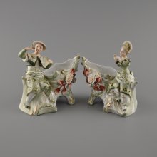 Dva figurální porcelánové květináče s pohyblivou části trupu