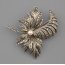 Stříbrná brož ve tvaru listu s perlou